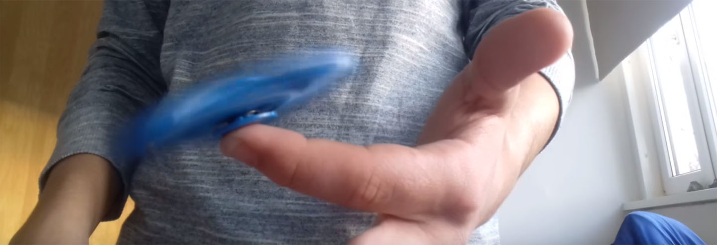 trucos entre los dedos para fidget spinner